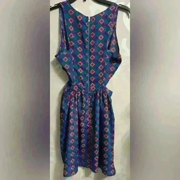 Dress with cut outs  - Picture 2 of 3